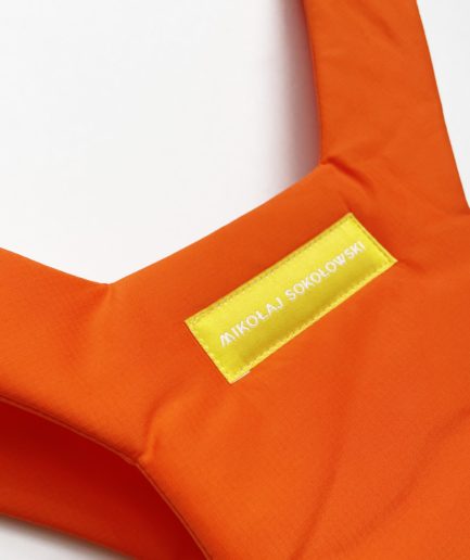 Orange puffer vest