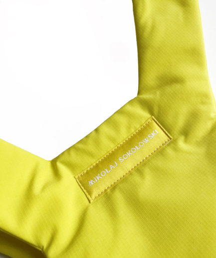Yellow puffer vest